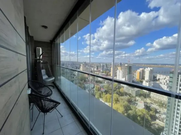 Скляні розсувні двері